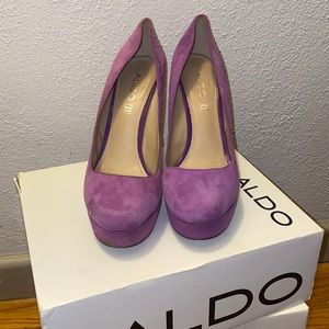 Aldo high heel platform plum colored shoes, size 8. Worn a couple of times.